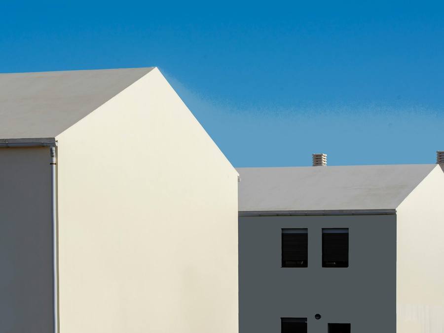 A rendered semi-detached pair — the most common UK home and a typical cost reference point