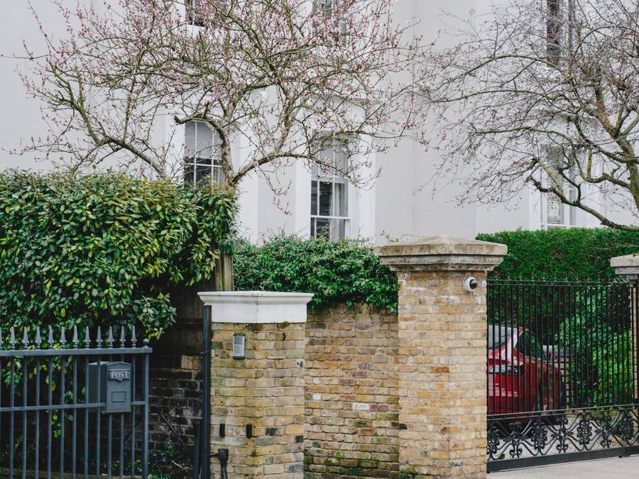 A home in a clean white silicone render finish